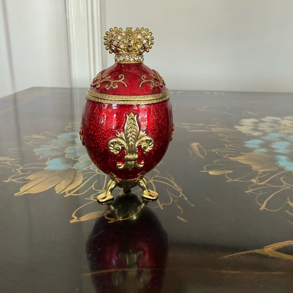 Elegant Red and Gold Decorative Egg with Crown Accent
